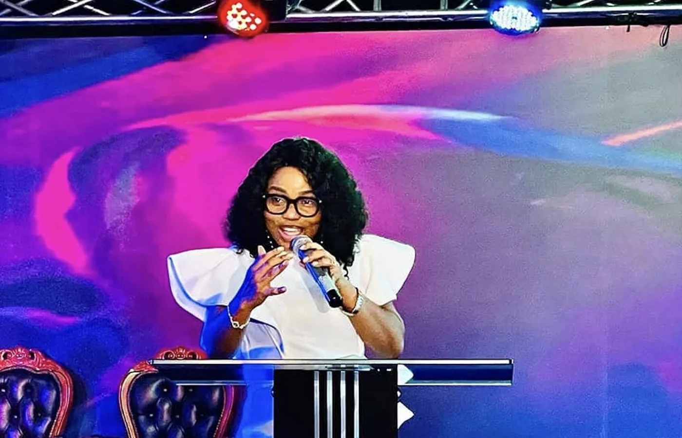 Victoria Reuben speaking at a conference